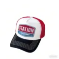 Detailed close-up of a stylish American vintage trucker hat with embroidered patch design. - Since1865-White + Black Brim