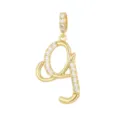 Primo piano di un ciondolo a lettera g placcato oro con pietre di zircone scintillanti. - Stile G