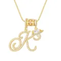 Elegante ketting met letter K hanger en hart-planeet steen, goudkleurige finish - Schrijfletter K (DXL-065) / Goud