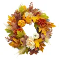 Detailed view of an autumn wreath featuring maple leaves, mini pumpkins and peonies. - New Autumn Eucalyptus Wreath / Boxed