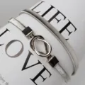 Silver elastic metal waist belt with teardrop buckle, stylish accessory for dresses and outfits. - 60CM / Silver