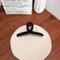 Grande pince à cheveux noire mate en ruban pour chignons élégants et coiffure polyvalente - Noir
