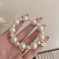 Elegant multi-sized white pearl hair tie and bracelet dual-use accessory for women - Small Round Label