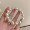 Elegant Korean style large white pearl hair tie and bracelet dual-use fashion accessory - Round Bead Style