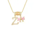 Detailaufnahme der vergoldeten Kette mit Zirkonia-Buchstabe Z und rosa Herz-Bogen-Anhänger. - Buchstabe Z / Anhänger + Boxkette / Gold