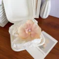 Peach orchid flower hair clip with pearl detail for ethereal forest style aesthetic - Light Orange