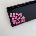 Adorable mini horquilla de 2,5 cm con forma de hueso rosa y lunares de colores para niños - Rosa Fucsia de Lunares