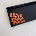 Mini pinzas para el pelo naranja con forma de hueso y lunares para niños y mascotas. - Lunares Naranjas