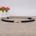 Elegante smalle zwarte damesriem met chique gouden parelgesp voor jurken en taille. - Blauw