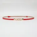 Cintura sottile rossa da donna in pelle verniciata con fibbia perla strass variante - Rosso
