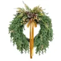 Detailed close-up of a Norfolk pine Christmas wreath with golden berries and ribbon - Norfolk Pine Wreath / 60CM / Green