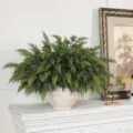 Artificial cedar plant in white ceramic vase on mantel for elegant home decoration - 24 Pcs/Set