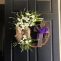 Close-up of Easter wreath with white lilies, burlap bow and purple draped cross - Cross Wreath (Purple Scarf) / 40CM