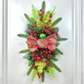 Christmas staircase swag with plaid bow, red berries, pine branches, and green ornaments - 60x30CM No Lights