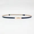 Women's slim leather belt in navy blue with gold metal buckle, stylish dress accessory. - Blue