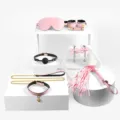 Set di legatura BDSM professionale in pelle rosa con collare, manette, frusta e benda. - Set da 7 Pezzi con Tutorial / Rosa