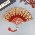 Traditioneller chinesischer roter Faltfächer mit goldener Spitzenstickerei und Quaste - Rot mit Quaste