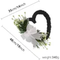 Ghirlanda floreale nera a forma di cuore con fiocco bianco, 48x35cm e 340g. - 45cm / Bianco