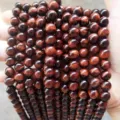 Macro view of polished natural red tiger eye round beads for DIY jewelry craft - 16mm/Approx. 23 Pieces / 5A Natural Red Tiger Eye