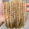 Macroweergave van gouden synthetische citrien kristallen ronde kralen met insluitsels - 6mm (Ongeveer 60 Stuks) / Synthetisch Koffie Watermeloen Kristal