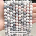 Close-up view of matte natural pink zebra jasper stone beads for DIY jewelry making. - 6mm / 60 Counts / Matte Natural Pink Zebra Stone