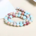 Natural sea blue and reddish brown snake skin stone round beads for DIY jewelry making - 10mm (Approx 37 Beads) / Synthetic Sea Blue Snake Skin Jasper