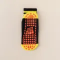 Non-slip trampoline socks, black and yellow indoor grip socks with orange dots for fitness yoga. - Black