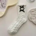 Thick warm coral fleece mid-tube socks for women with sweet cute black bow design. - White Double Knot