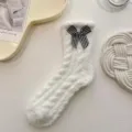 White fluffy coral fleece mid tube socks with black white plaid bow for women cozy winter sleep - White Bow