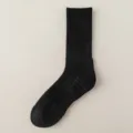 Black cotton mid-calf athletic socks with ribbed leg and cushioned sole design, ideal. - One Size (Size 38-43) / High-Top / Black