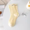 Women yellow ribbed crew socks with letter cuff, casual cotton trendy sock variant style - One Size / Yellow