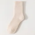 Thickened warm women's wool socks in cozy mid-tube design, soft knit winter thermal style variant. - Oatmeal