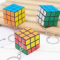 Mini 3x3 magic cube keychain, portable puzzle toy pendant with metal chain for bags keys. - Random Mixed