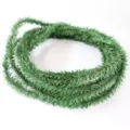 Dettaglio della ghirlanda decorativa verde per confezioni floreali e artigianato - 1,5 cm di larghezza / Verde