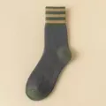 Women thick striped mid-tube socks, dark gray with green heel and striped ribbed cuff. - Gray