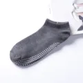 Men's grey grip yoga socks with anti-slip dots on sole for gym and home floor workouts. - One Size / Dark Gray