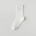 Plain white mid-tube cotton socks for women, soft seamless knit design for daily wear. - One Size / White