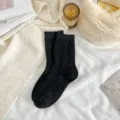 Cozy black cable knit wool socks for women, thick winter warm thermal mid-tube hosiery. - One Size / Black
