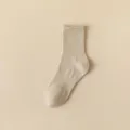 Comfortable cotton ribbed crew socks in versatile beige color, perfect for daily wear. - One Size / Camel