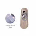 Chaussettes de yoga antiderapantes avec picots et brides croisees couleur abricot. - Taille unique / Abricot