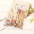 Natural bamboo ear picks with cute wooden doll head beads, eco-friendly cleaning tools set. - Colorful