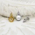 Macro detail of castle-shaped pearl setting pendants in gold and silver plating. - Castle Style / 11.5*20.5mm / 18K Gold