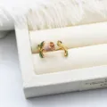 Detailed view of pink enamel rose open ring featuring an empty pearl setting for DIY - Pink Flower with Green Leaf Style