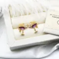 Detail view of cocktail glass earrings with purple enamel, white pearls and crystals - Wine Glass Shape (15*18.7mm) / One Pair / Purple