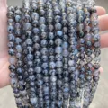 Close-up of natural black dragon vein agate round loose beads for DIY jewelry making projects - 4mm approx 90pcs / Enhanced Black Dragon Vein Agate
