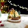 Festive glowing Christmas snow house music box with rotating train, 16.5cm dimensions - Gingerbread Train Musical Box