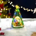 Festive LED Christmas tree ornament with rotating train and glowing snow house scene - Green Christmas Tree Musical Box