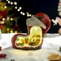 Glowing Christmas boot decoration with rotating train and snow scene music box 848g - Red Boots Musical Box