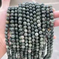 Natural dark green mottled stone round beads for DIY jewelry making and bracelets. - 8mm (Approx 47 Beads) / Natural Green Wood Grain Stone