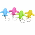 Portachiavi aereo luminoso a LED simpatico giocattolo in plastica colorata borsa - Multicolore
